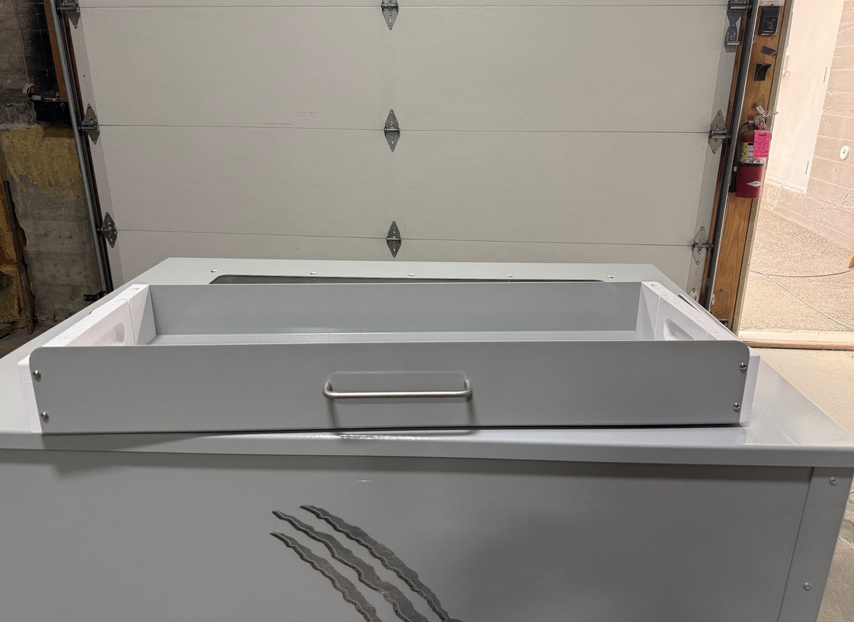 Collection tray on the Wolverine tumbler